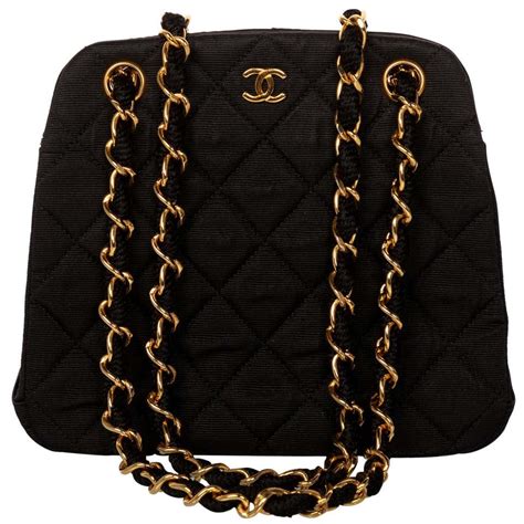 black chanel bag with gold chain|small black quilted chanel bag.